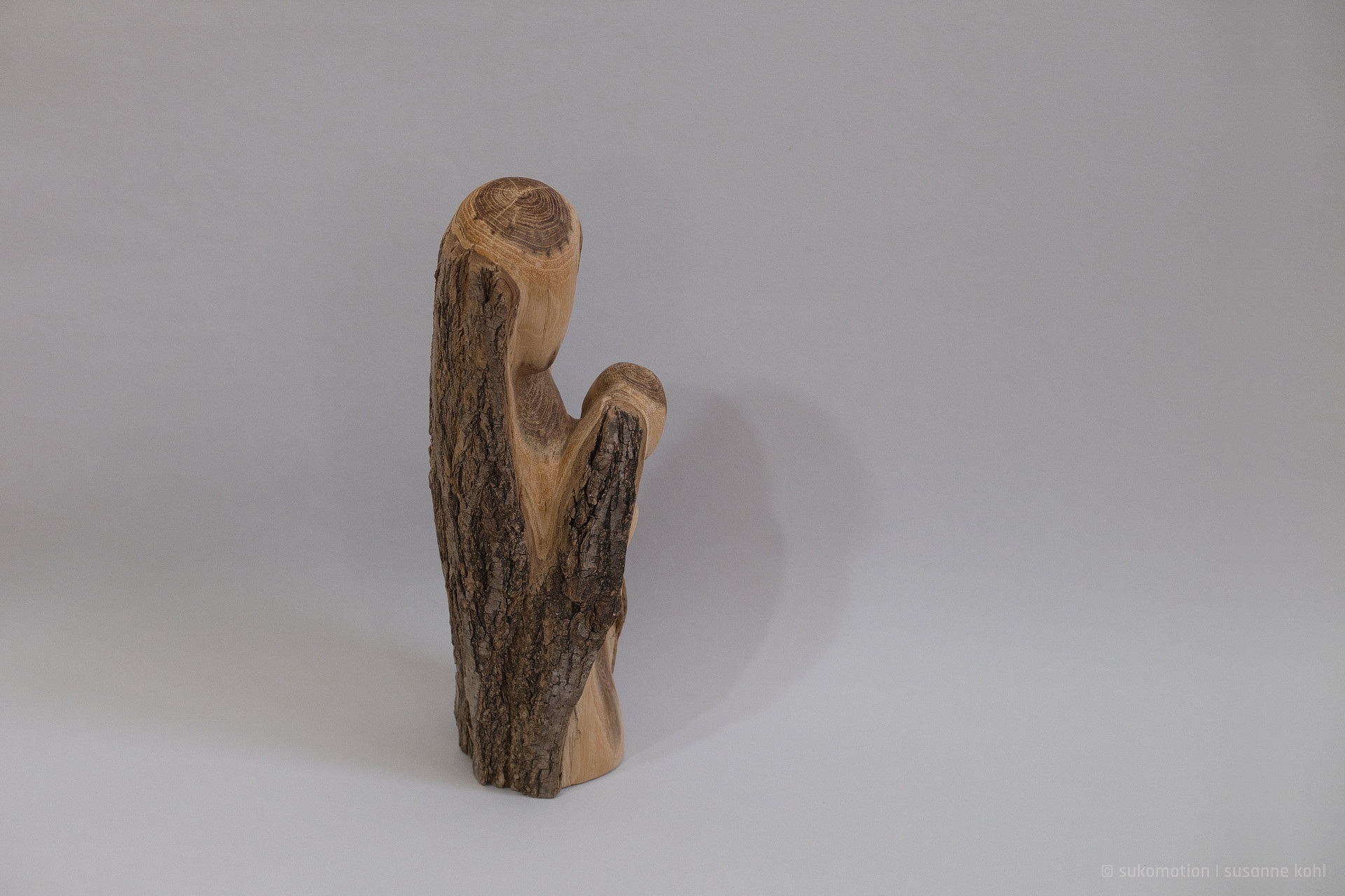 safe & curious - woodsculpture with bark  by sukomotion | susanne kohl - berlin